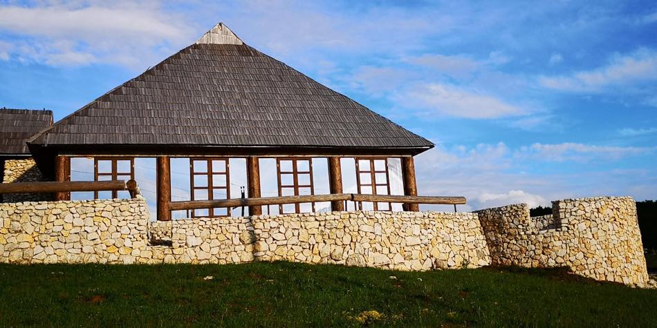 The restaurant with hand-laid stone wall and timber glazing